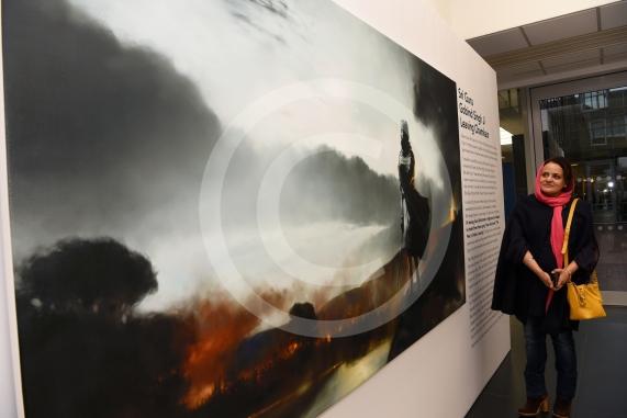 Jaz Dhillon looks at a painting of Sri Guru Gobind Singh Ji leaving Chamkaur.A Sikh art exhibition which brings together the work of renowned Canadian artist Kanwar Singh and art from young volunteers from Slough is launching at the Guru Maneyo Granth Gurdwara.Guru Maneyo Granth Gurdwara, Bath Rd, Slough