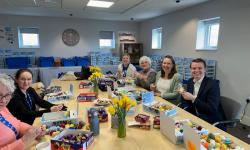 Volunteers stuff thousands of knitted creations as part of Big Chick Knit campaign 