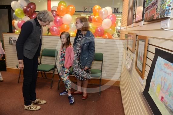 Maidenhead and Me presentation &ndash; Prime Minister Theresa May awarding the prizes and pix of people looking at the exhibition etc. Unit 26 Nicholsons Centre,Maidenhead                         
