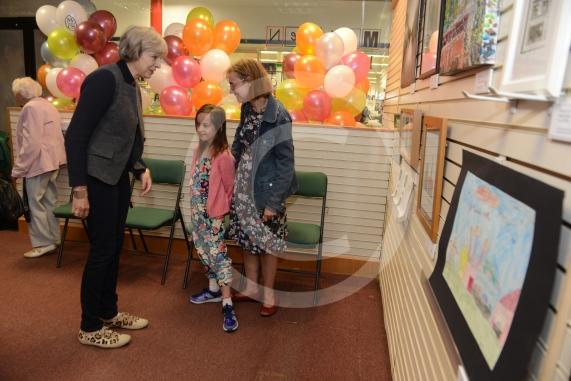 Maidenhead and Me presentation &ndash; Prime Minister Theresa May awarding the prizes and pix of people looking at the exhibition etc. Unit 26 Nicholsons Centre,Maidenhead                         