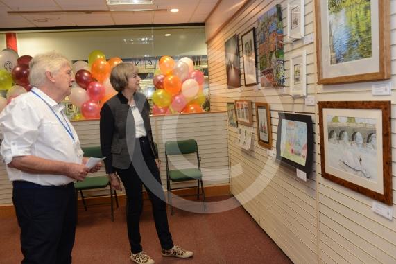 Maidenhead and Me presentation &ndash; Prime Minister Theresa May awarding the prizes and pix of people looking at the exhibition etc. Unit 26 Nicholsons Centre,Maidenhead                         