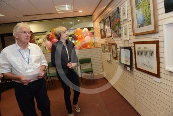Maidenhead and Me presentation &ndash; Prime Minister Theresa May awarding the prizes and pix of people looking at the exhibition etc. Unit 26 Nicholsons Centre,Maidenhead                         