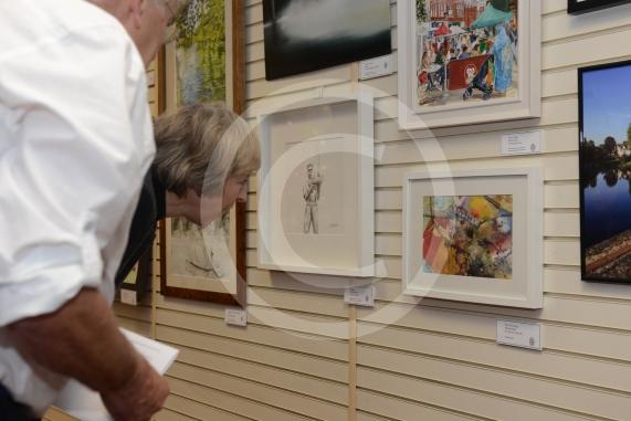 Maidenhead and Me presentation &ndash; Prime Minister Theresa May awarding the prizes and pix of people looking at the exhibition etc. Unit 26 Nicholsons Centre,Maidenhead                         
