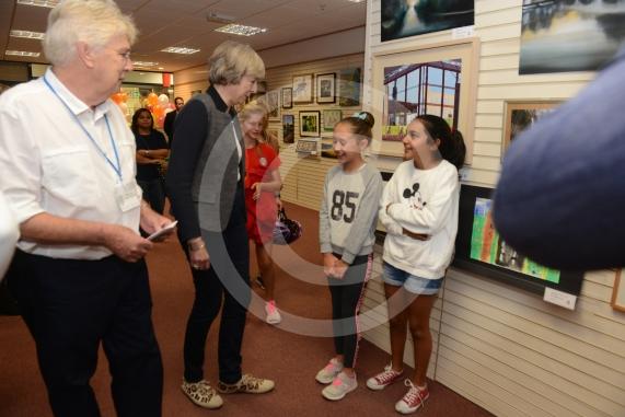 Maidenhead and Me presentation &ndash; Prime Minister Theresa May awarding the prizes and pix of people looking at the exhibition etc. Unit 26 Nicholsons Centre,Maidenhead                         