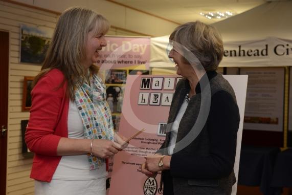 Maidenhead and Me presentation &ndash; Prime Minister Theresa May awarding the prizes and pix of people looking at the exhibition etc. Unit 26 Nicholsons Centre,Maidenhead                         