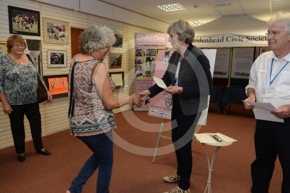 Maidenhead and Me presentation &ndash; Prime Minister Theresa May awarding the prizes and pix of people looking at the exhibition etc. Unit 26 Nicholsons Centre,Maidenhead                         