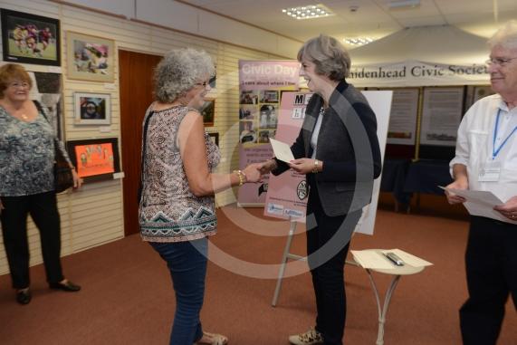 Maidenhead and Me presentation &ndash; Prime Minister Theresa May awarding the prizes and pix of people looking at the exhibition etc. Unit 26 Nicholsons Centre,Maidenhead                         