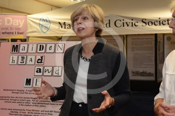 Maidenhead and Me presentation &ndash; Prime Minister Theresa May awarding the prizes and pix of people looking at the exhibition etc. Unit 26 Nicholsons Centre,Maidenhead                         