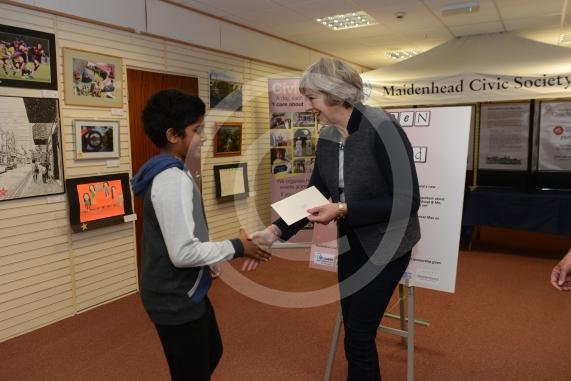 Dhruv Nair 10 -2nd prize. Maidenhead and Me presentation &ndash; Prime Minister Theresa May awarding the prizes and pix of people looking at the exhibition etc. Unit 26 Nicholsons Centre,Maidenhead                         