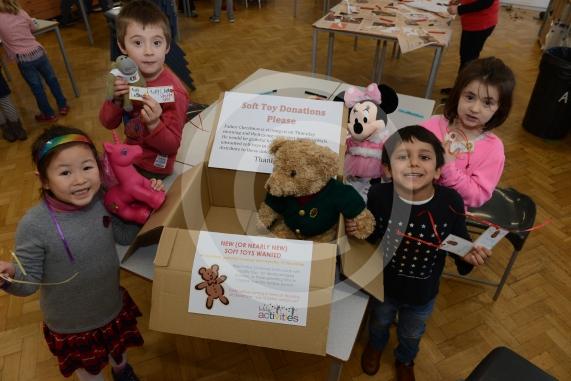 L-R Leonie Trinh 6, Morgan Munn 6, Sebastian Bose 6, Caitlin Limb 5. College Avenue, Maidenhead. Claires Court holiday club. Children will be giving presents to santa and he will be giving them to poorly children in hospital. Children bring toys with a Christmas wish or message, to personalise the gift. 