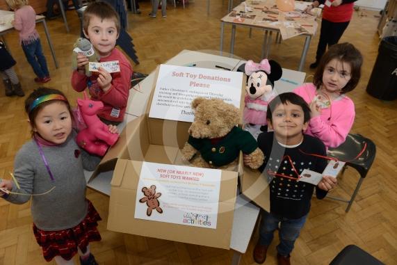 L-R Leonie Trinh 6, Morgan Munn 6, Sebastian Bose 6, Caitlin Limb 5. College Avenue, Maidenhead. Claires Court holiday club. Children will be giving presents to santa and he will be giving them to poorly children in hospital. Children bring toys with a Christmas wish or message, to personalise the gift. 