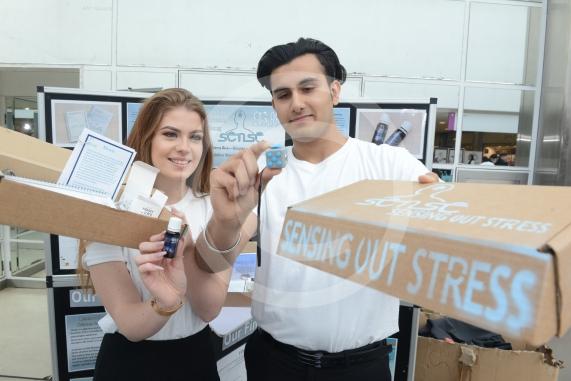 LtoR Georgia Wedgbury, 17, Sayan Gogia, 16. Burnham Grammar School.Young Enterprise stands.Queensmere Observatory Shopping Centre,Slough. 
