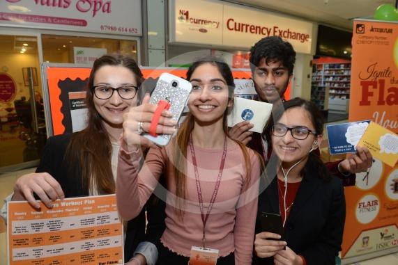 LtoR Maja Dobrowoiska, 17, Ravieen Bajwa, 16, Dhirvesh Budhan, 16, Madeeha Khan, 16. Upton Court Grammar School Young Enterprise stands.Queensmere Observatory Shopping Centre,Slough. 