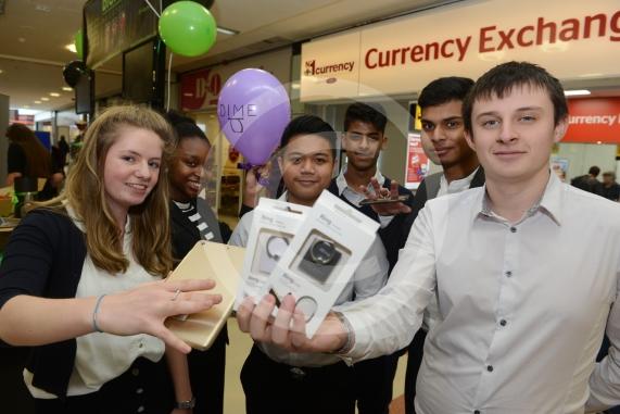 LtoR Tara Adams, 17, Jalisa Ogundelu, 16, Kim Amon, 16, Bliss Marques, 16, Johance Fernandes, 17, Michael Oxlade, 17. St Bernards School .Young Enterprise stands.Queensmere Observatory Shopping Centre,Slough. 