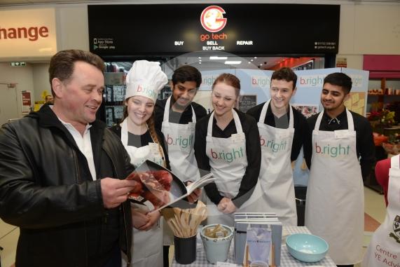 LtoR Chris Barron, Pippa Russell, 17, Abdullah Ihsan, 18, Elsie Cairns, 17, Ben Cox, 16, Ateeq Iqbal, 18. Desborough College.Young Enterprise stands.Queensmere Observatory Shopping Centre,Slough. 