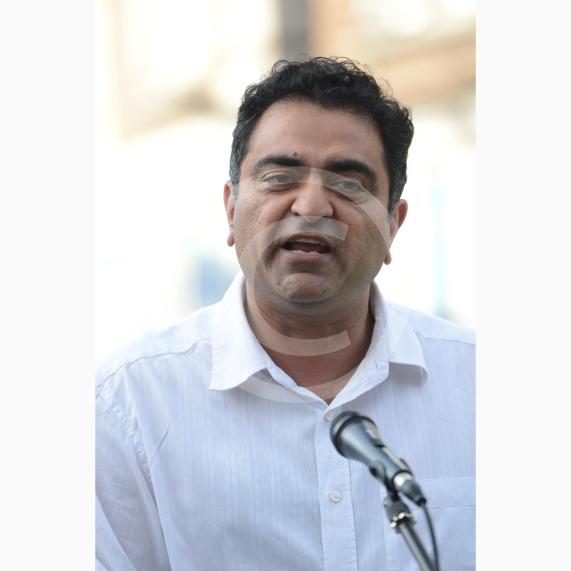 Leader of Slough Council, Councillor Sohail Munawar. Slough High Street, Slough. A vigil in memory of the people who lost their lives in last night’s Manchester attack.