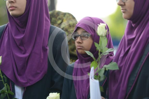 L-R Aish Tahir 14, Munaima Tafhimi 12, Sumayya Tafhimi 14 from Eden Girls' School. Slough High Street, Slough. A vigil in memory of the people who lost their lives in last night’s Manchester attack.