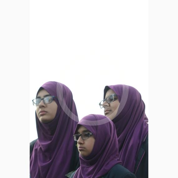 L-R Aish Tahir 14, Munaima Tafhimi 12, Sumayya Tafhimi 14 from Eden Girls' School. Slough High Street, Slough. A vigil in memory of the people who lost their lives in last night’s Manchester attack.