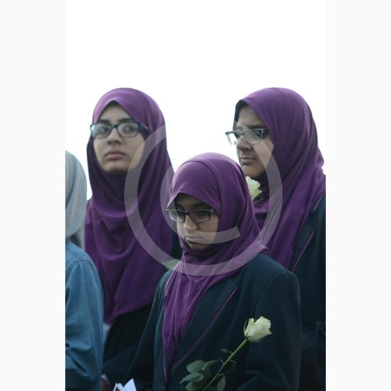 L-R Aish Tahir 14, Munaima Tafhimi 12, Sumayya Tafhimi 14 from Eden Girls' School. Slough High Street, Slough. A vigil in memory of the people who lost their lives in last night’s Manchester attack.
