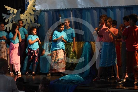 Cippenham Primary School, Elmshott Lane, Cippenham. Year six pupils at Cippenham Primary School are running through their dress rehearsal for this year’s play ‘The Peace Child’ which tells the story of two warring tribes separated by a raging river in the vibrant land of Mambika.