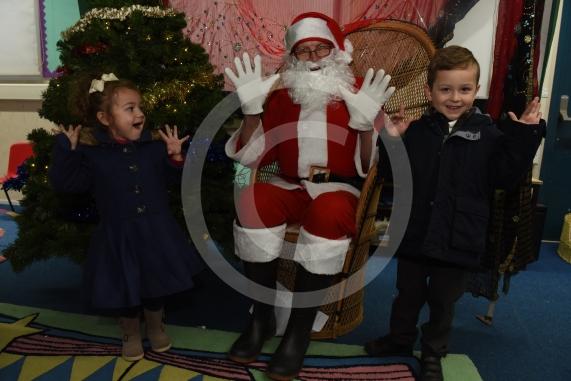 Chloe Kelly 3, Santa, Daniel Kelly 4. Cippenham Infant School, Dennis Way, Slough. A Christmas fair.