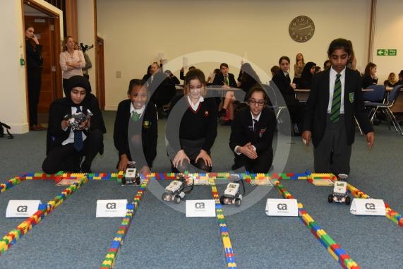 CA Technologies, Ditton Park, Riding Court Road, Datchet. LEGO MINSTORMS event- 60 female year 7 students working in small teams to build a LEGO robot before programming it and racing them. Robot race grand final 