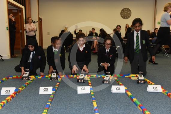 CA Technologies, Ditton Park, Riding Court Road, Datchet. LEGO MINSTORMS event- 60 female year 7 students working in small teams to build a LEGO robot before programming it and racing them. Robot race grand final 