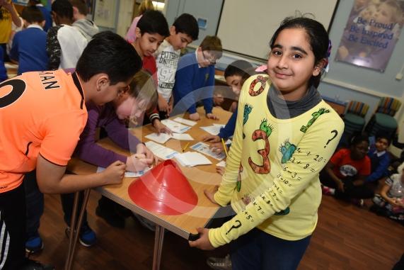 Cippenham Primary School, Elmshott Lane, Cippenham. Children are wearing items of clothing with a number or mathematical symbol on to raise money for the NSPCC as part of the the charity&rsquo;s &lsquo;Number Day&rsquo; campaign. Isha Khan 9.