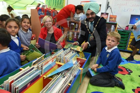 Cippenham Inftnat School, Dennis Way, Slough The Mayor of Slough Cllr Paul Sohal will be opening a newly refurbished library at the school. L-R Zara Hussain 6, Iasha Badhwal 6, Co-head Stephanie Holding, Mayor of Slough Cllr Paul Sohal, Kaiden Carlen 6. 