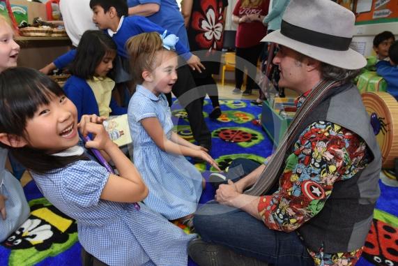 Cippenham Inftnat School, Dennis Way, Slough The Mayor of Slough Cllr Paul Sohal will be opening a newly refurbished library at the school. L-R Yula Kin 7, Barbara Connors 7, Guest Author Andy Robb