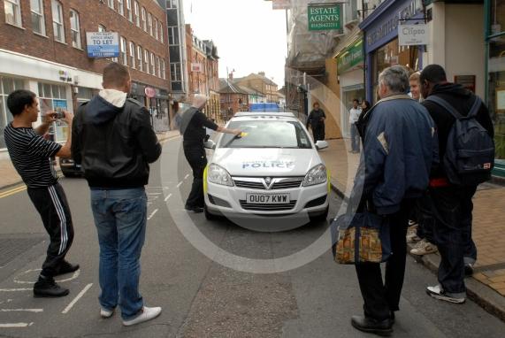 2009 - A Policeman rerturns to find his police car has a parking ticket.Ian Longthorne, staff photographer at Baylis Media which publishes the Maidenhead Advertiser and the Windsor & Slough Express marks his 10th year in the job with a photographic review of the last decade. Maidenhead Advertiser - 2009