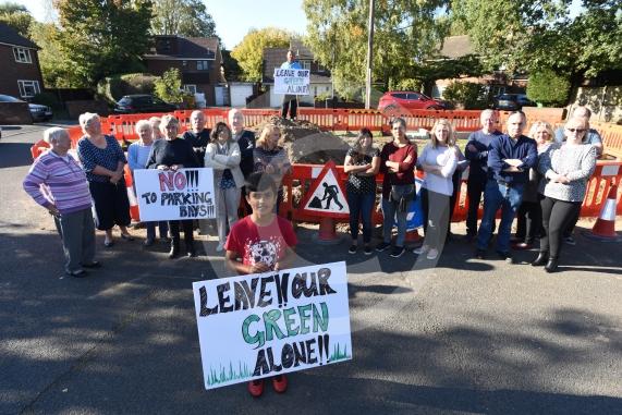 Cippenham Close, Slough. A group of residents are furious about Slough Borough Council&rsquo;s plans to put in five new car parking spaces over a green in Cippenham Close which they say they do not want.