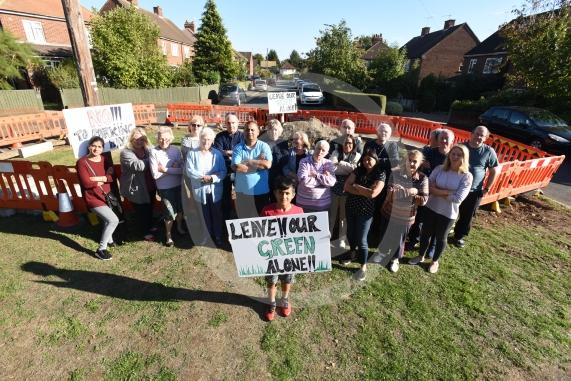 Cippenham Close, Slough. A group of residents are furious about Slough Borough Council&rsquo;s plans to put in five new car parking spaces over a green in Cippenham Close which they say they do not want.