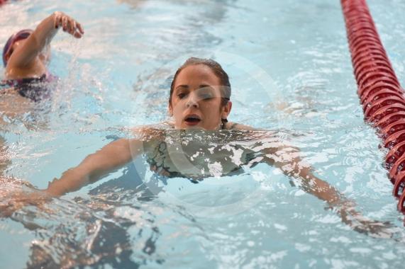 A swimmer completes a length of the pool.The 22nd  Windsor Lions Annual Swimathon.Windsor Leisure centre, Clewer Mead, Stovell Rd, Windsor.