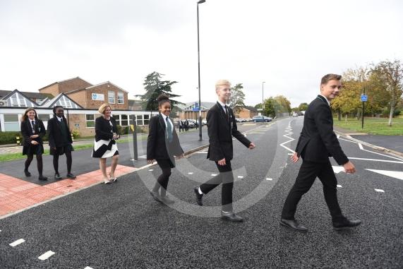Headteacher, Frances Walsh, and some children by the traffic light crossing outside the school. The school have had an application to install double yellow lines approved.Cox Green School, Highfield Lane, Maidenhead 