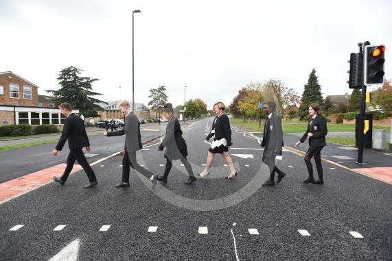 Headteacher, Frances Walsh, and some children by the traffic light crossing outside the school. The school have had an application to install double yellow lines approved.Cox Green School, Highfield Lane, Maidenhead 
