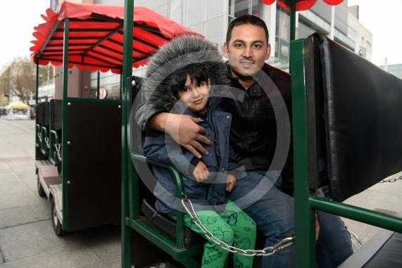 LtoR Arshmaan Ali, four and Hassan Ali have a ride on the land train.Slough Borough Council&rsquo;s Festive Fun event.Slough Town Square and Slough High Street.