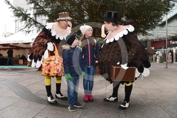 Oliver Prochacki, six and Victoria Prochacki, 10, meet the tap dancing turkeys.Slough Borough Council&rsquo;s Festive Fun event.Slough Town Square and Slough High Street.