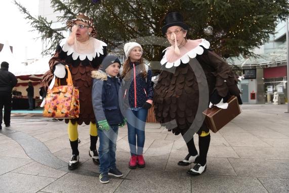 Oliver Prochacki, six and Victoria Prochacki, 10, meet the tap dancing turkeys.Slough Borough Council&rsquo;s Festive Fun event.Slough Town Square and Slough High Street.