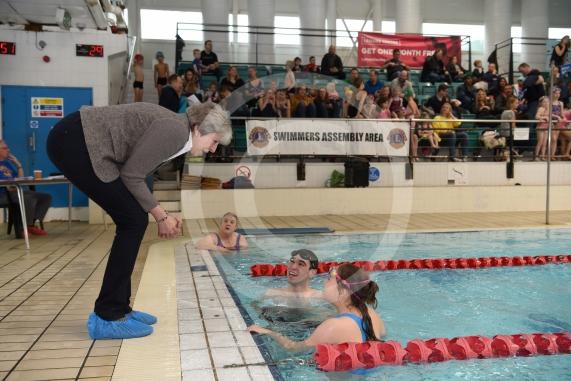 The Prime Minister Theresa May meets swimmers.The Prime Minister Theresa May and Philip May visit the 34th Maidenhead Swimarathon at the  Magnet Leisure Centre, Holmanleaze, Maidenhead. 