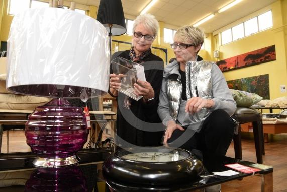 LtoR Sally Jenkins and Laura Greene look at a vase.Cookham Rise Primary School is holding an interior design sale courtesy of Pepperstitch Designs. Cookham Rise Primary School, High Rd, Cookham.