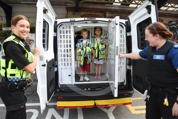 An emergency services day will take place at Maidenhead Station. The public can view a range of vehicles, appliances and equipment, and meet emergency service staff. Organised by Great Western Railway. L-R PC Cook, Aran Esterhuysen 6, Bella Esterhuysen 8, PCSO Andrews