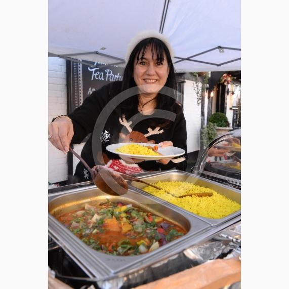 Owner of the Spice Merchant, Aysha Islam.Cookham Christmas Street Fayre 2019, High Street, Cookham.