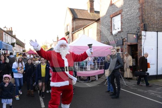Father Christmas arrives at the fayre.Cookham Christmas Street Fayre 2019, High Street, Cookham.