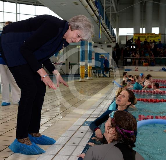 Theresa May talks to swimmers at the Maidenhead Lions Club Swimarathon 2019.Magnet Leisure Centre, Holmanleaze, Maidenhead