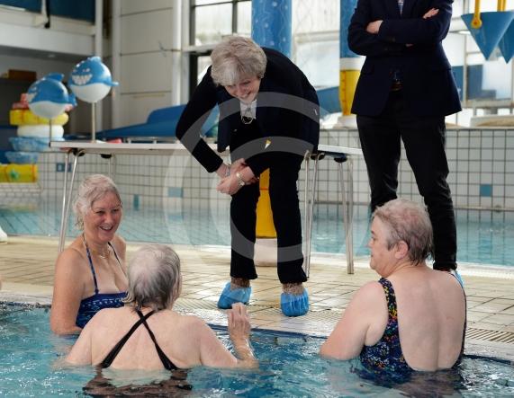 Theresa May talks to swimmers at the Maidenhead Lions Club Swimarathon 2019.Magnet Leisure Centre, Holmanleaze, Maidenhead