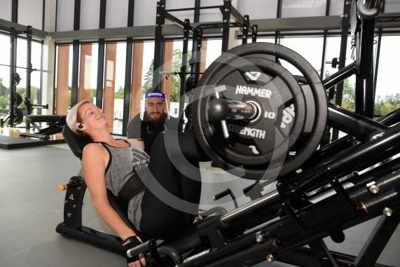 Alex Robinson uses a leg press watched by fitness instuctor Charlie Keeley.Opening day at the new Braywick Leisure Centre.Braywick Leisure Centre, Braywick Road, Maidenhead.