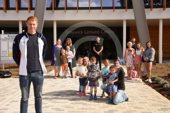 GB swimmer Tom Dean visits the new Braywick Leisure Centre, pictured with competition winners and Jonny Walker.Opening day at the new Braywick Leisure Centre.Braywick Leisure Centre, Braywick Road, Maidenhead.