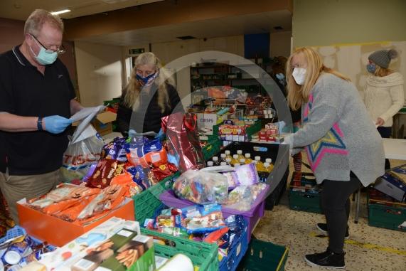 Christmas feature on Maidenhead Foodshare. They are bundling up some food bags to send out today. Maidenhead Food Share, in old Niocholsons Tesco unit