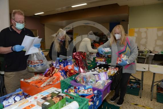 Christmas feature on Maidenhead Foodshare. They are bundling up some food bags to send out today. Maidenhead Food Share, in old Niocholsons Tesco unit